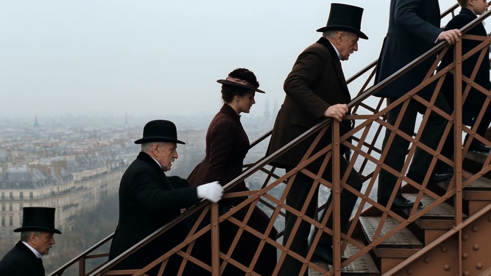 Visitors in 1889 dress climbing the tower's iron stairs above Paris